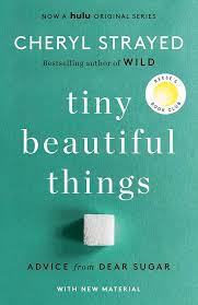 Book cover of Tiny Beautiful Things by Cheryl Strayed showing a blue background with a white cube.