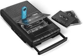 Image of an electronic device where a cassette tape is inserted along with a USB drive, so that the recording on the cassette can be digitized and uploaded to the USB drive. 