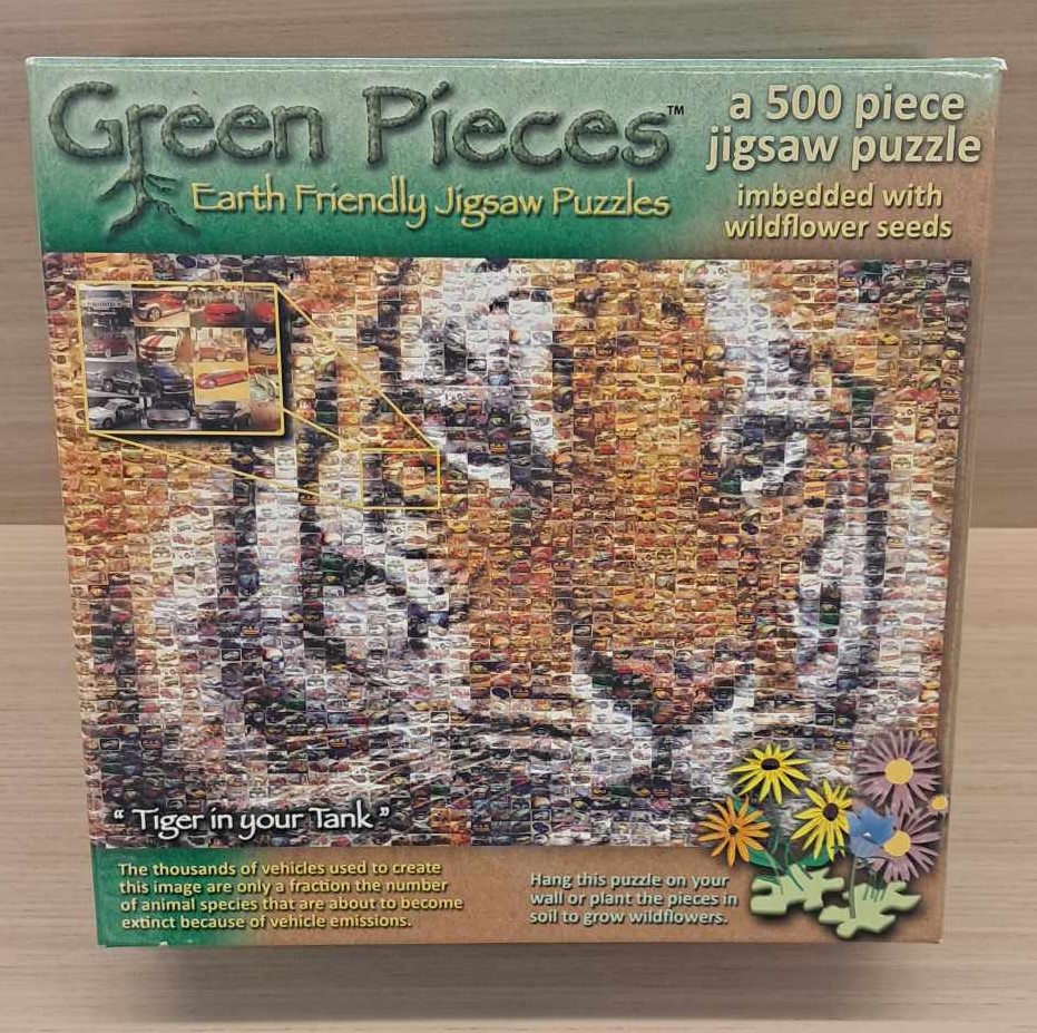 A puzzle cover with the image of a tiger made up of smaller images of cars.