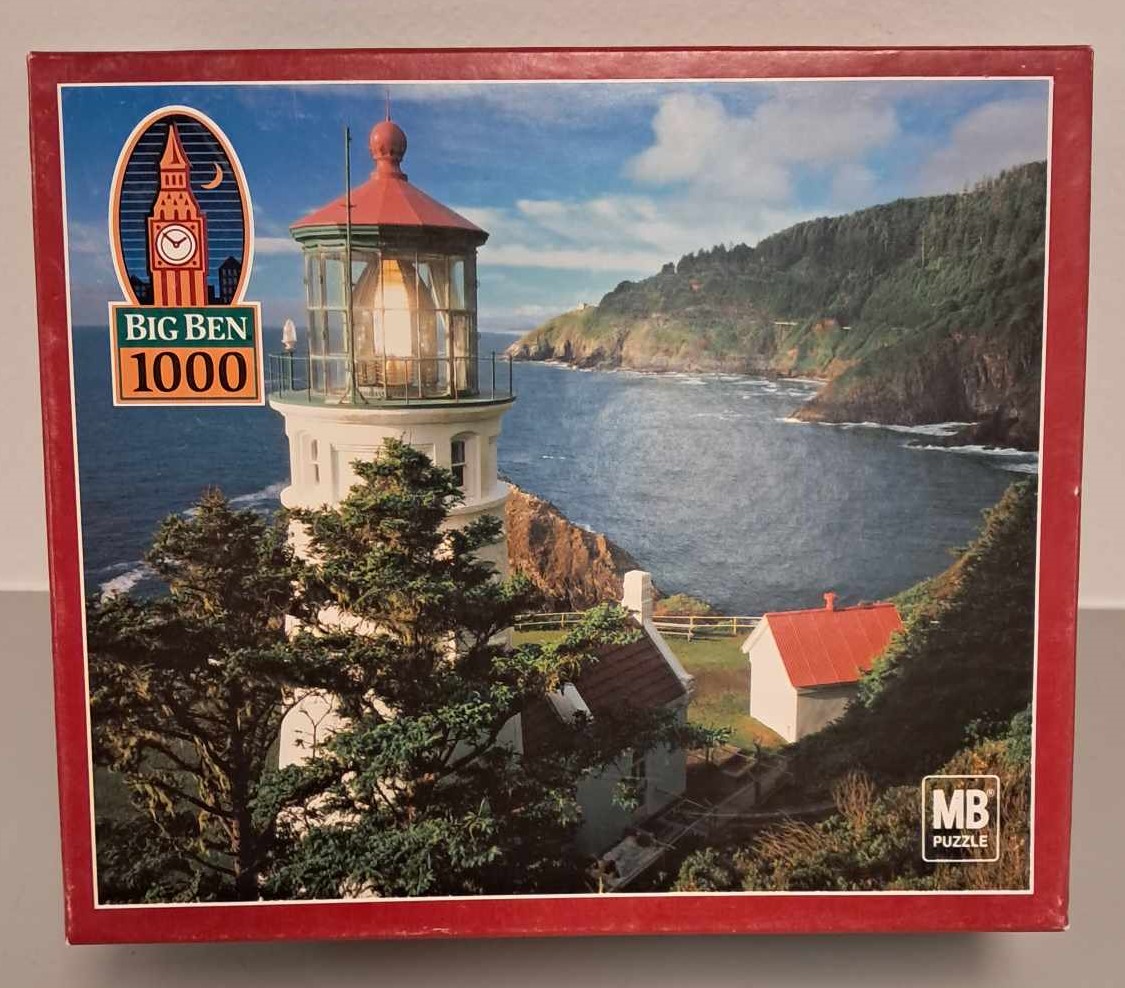 Image of a puzzle cover with a picture of the Heceta Head Lighthouse in Oregon.