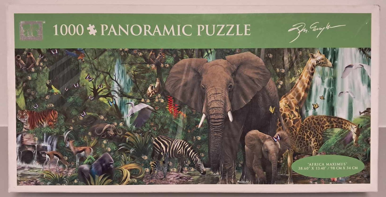 Image of a puzzle cover with an artistic drawing of animals like elephants, giraffes, and tigers in a jungle near a waterfall.