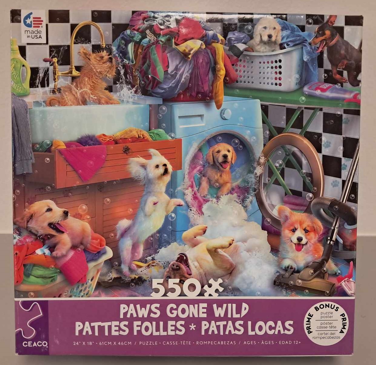 Image of a puzzle cover with cartoon drawings of dogs in a laundry room playing in the clothes and washing machine getting water everywhere.