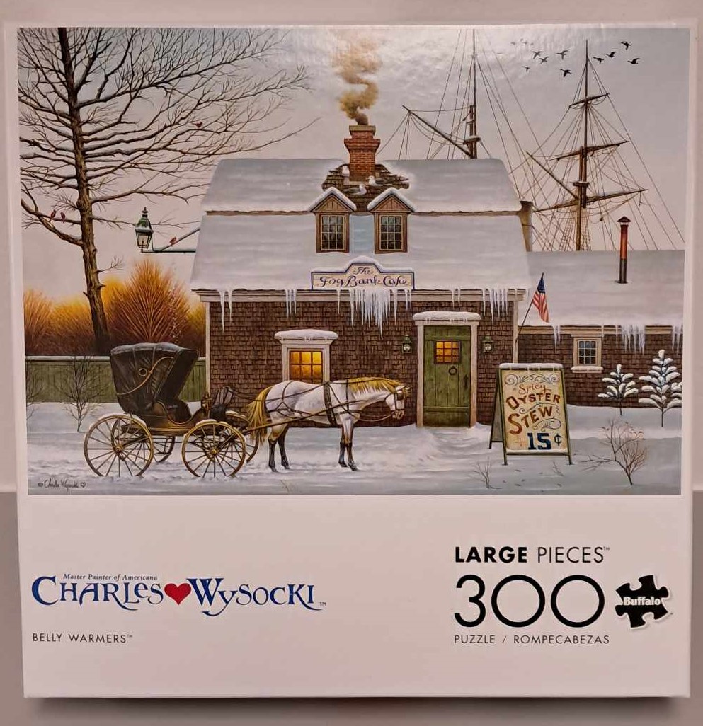 Puzzle cover showing an artistic drawing of a house covered in snow with a horse and carriage outside.