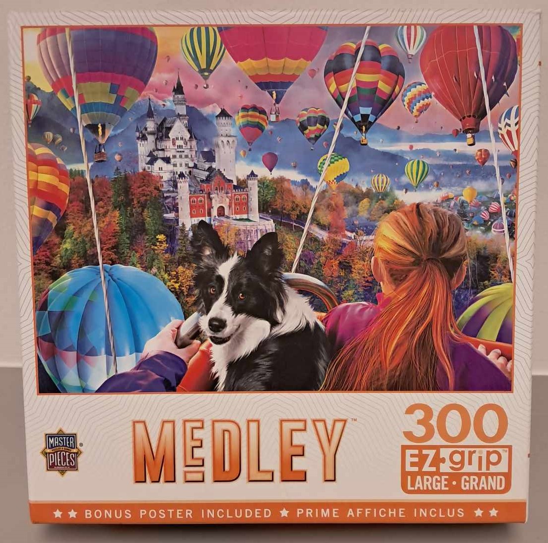 Puzzle cover showing an image of a dog surrounded by hot air balloons and a castle is in the background.