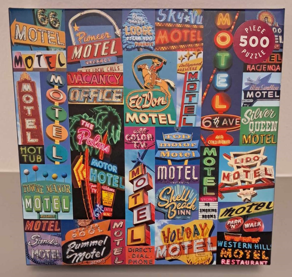 Puzzle cover showing a collage of differently styled motel signs.