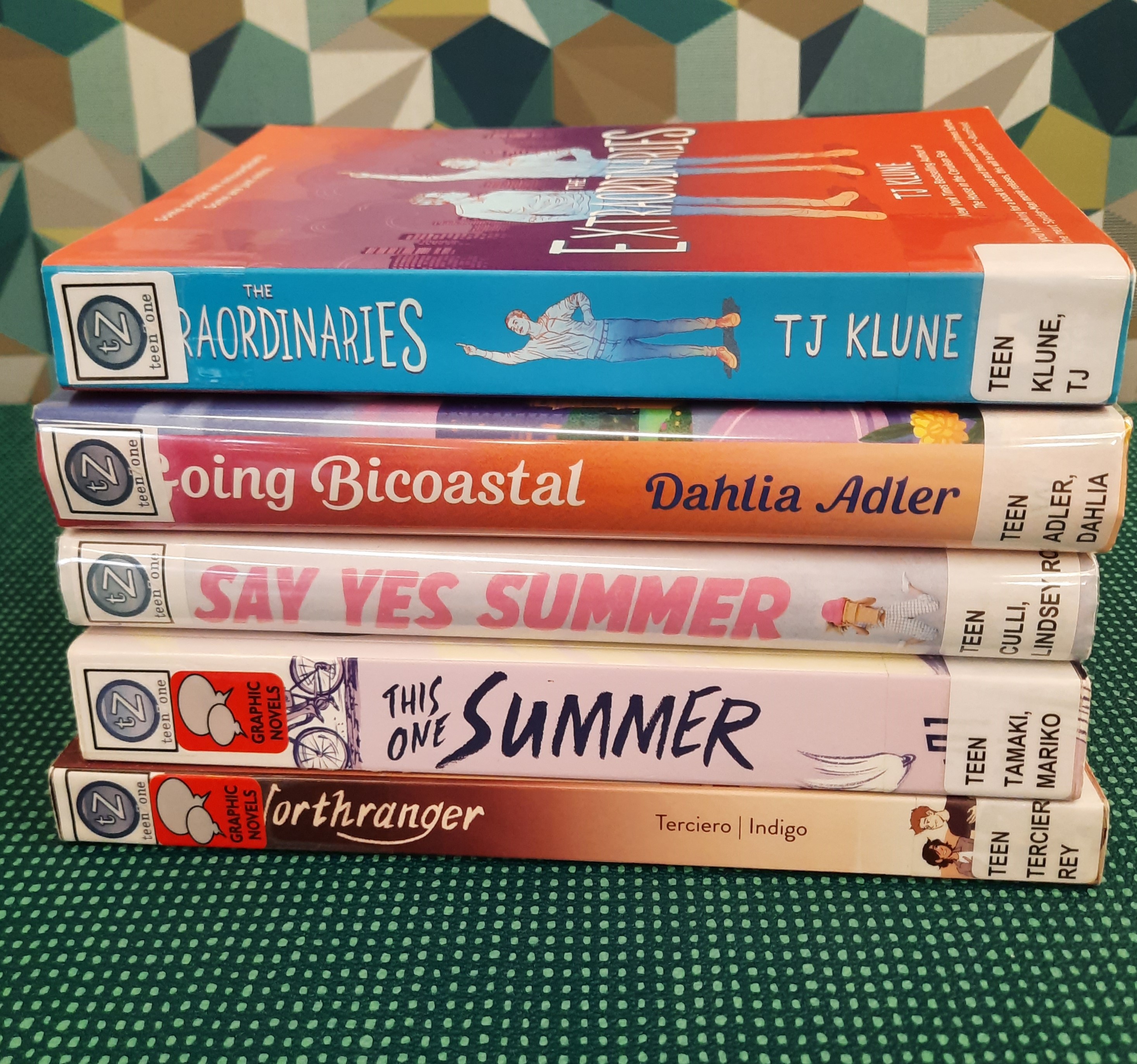 Book Stack showing the following titles: "The Extraordinaries," "Going Bicostal," "Say Yes to Summer," "This One Summer," and "Northranger"