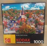 Image of Puzzle Cover titled "Montpelier, Vermont Townscape" Showing buildings in a small town surrounded by trees.
